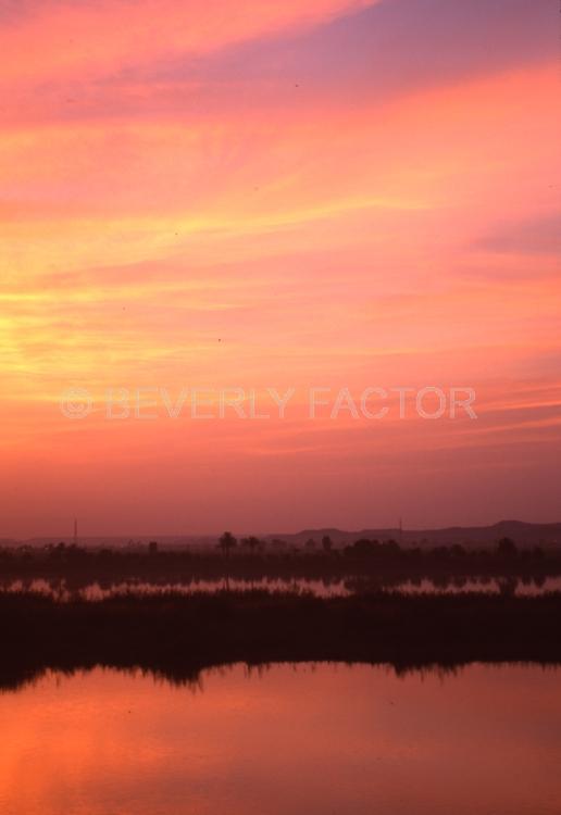 Islands;Sky;sunset;clouds;yellow;egypt;water;sillouettes;colorful;reflections